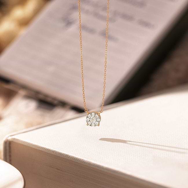 Gold necklace with one diamond on sale