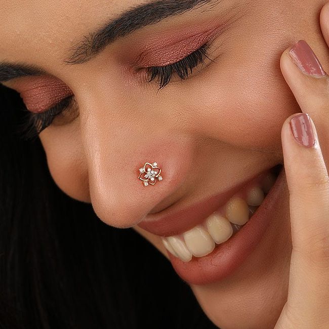 Swastik nose pin sale