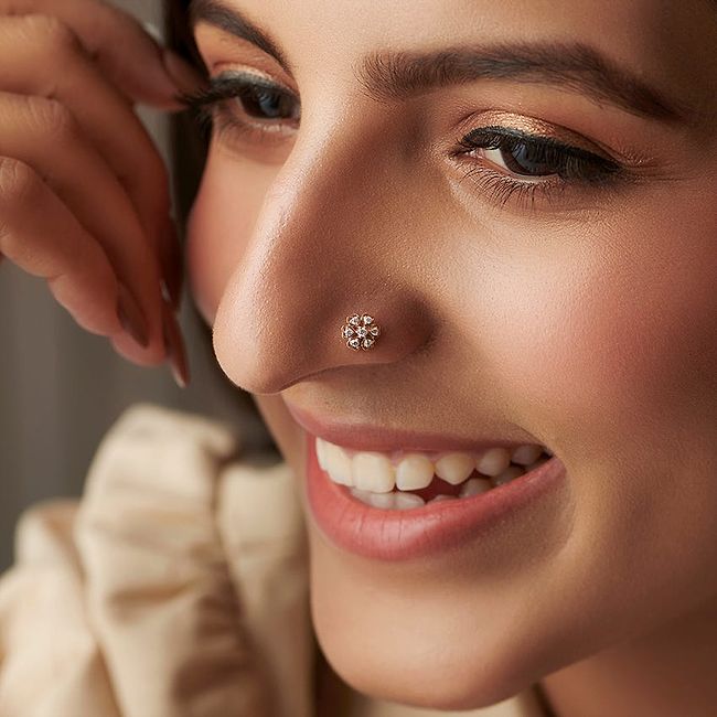 Buy Caratlane Beautiful Gold Nose Pin on Snapdeal | PaisaWapas.com