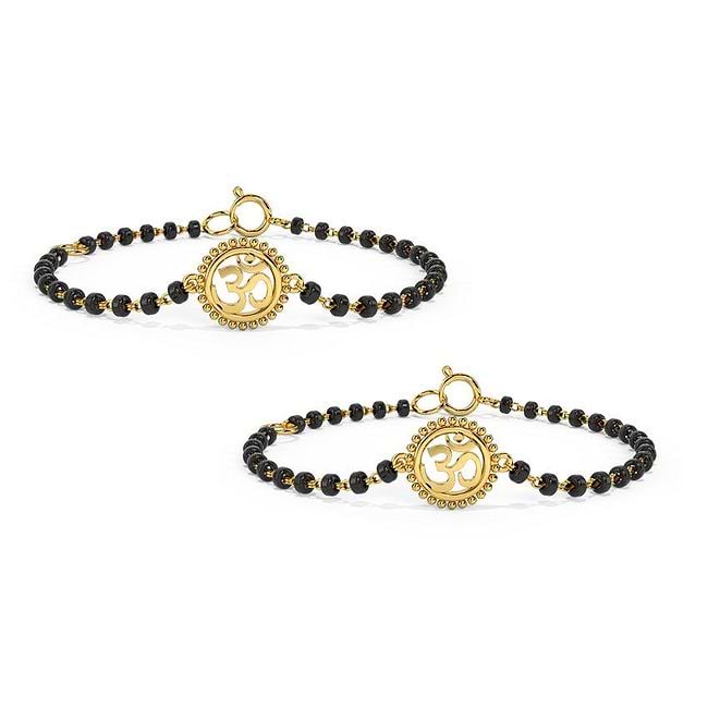 Black and gold bracelet for babies discount