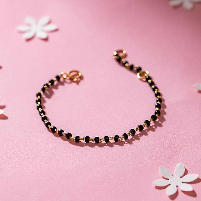Caratlane black beads bracelet discount